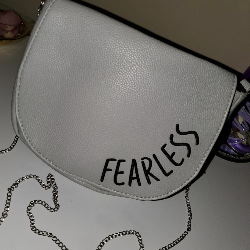 Cross body purse ..Fearless
